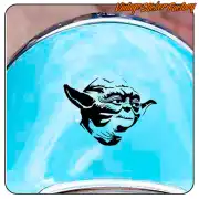 Black sticker with Yoda portrait applied to a curved blue surface