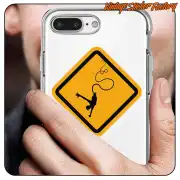 Yellow sticker with a suspended person silhouette, applied to a transparent mobile phone case