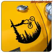 Black mountain biker design over a conifer landscape, applied to the yellow bodywork of a vehicle
