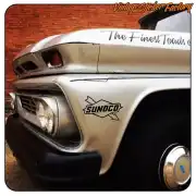 Black Sunoco logo applied to the side of a classic car