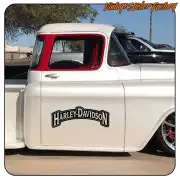 HARLEY-DAVIDSON text applied to the door of a classic pickup truck