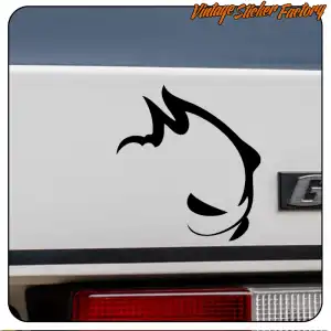 Black rabbit head design applied to the white rear of a Volkswagen vehicle