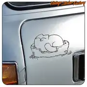 Simon’s Cat sticker sleeping applied to the side of a classic van