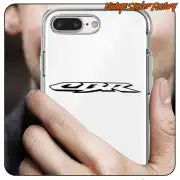 Black CBR sticker placed on the transparent casing of a mobile phone