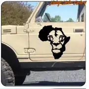 Black African lion applied to the door of an off-road vehicle