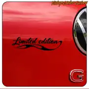 Black «Limited edition» text applied to the red bodywork of a car