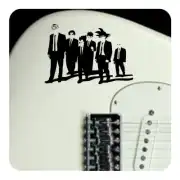 Black adhesive with six figures applied to the body of an electric guitar