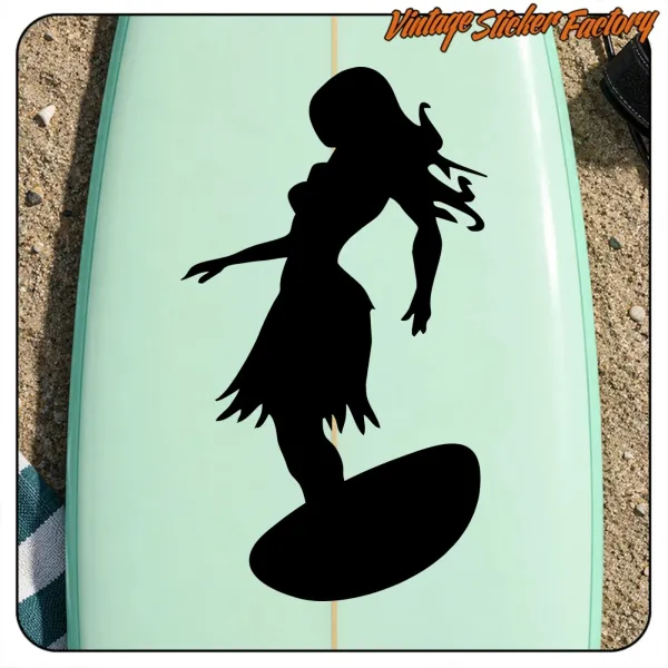 Détail du motif noir sur le thème du surf appliqué sur une planche vert clair