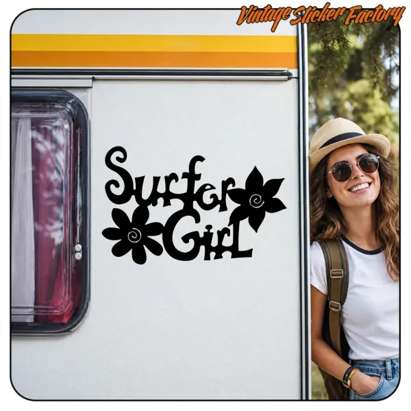 Black SURFER GIRL sticker on a caravan, with a woman standing beside it