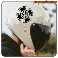 Close-up of a Maltese Cross with VW symbol on a helmet with a dark visor