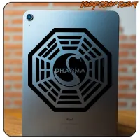 View of the black DHARMA sticker applied to the back of a tablet