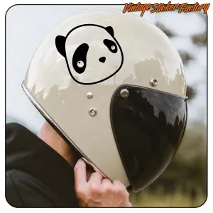 Panda face applied to the front of a light-colored motorcycle helmet
