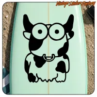 Cartoon cow with round glasses applied to a board, alternative view
