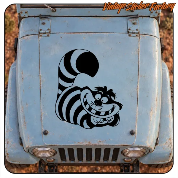 Front view of a blue vintage vehicle with the Cheshire Cat sticker on the bonnet