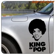 Sticker with Michael Jackson portrait and «KING OF POP» text applied to a car body