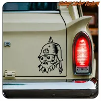 Alternative view of the skull with helmet and Maltese cross on a classic vehicle