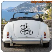 Rag doll rabbit applied to the boot lid of a classic convertible car