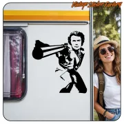 Dirty Harry vinyl applied to the side of a caravan next to a female traveller