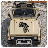 Beige SUV with the black African tribal design applied to the bonnet