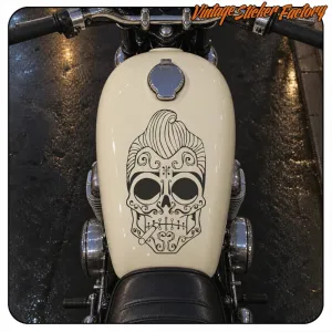 Ornamental black and white skull applied to the fuel tank of a motorcycle