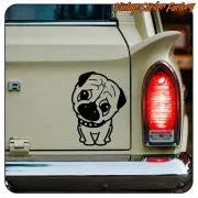Schwarz-weißer Hundeaufkleber auf der Rückseite eines klassischen Fahrzeugs