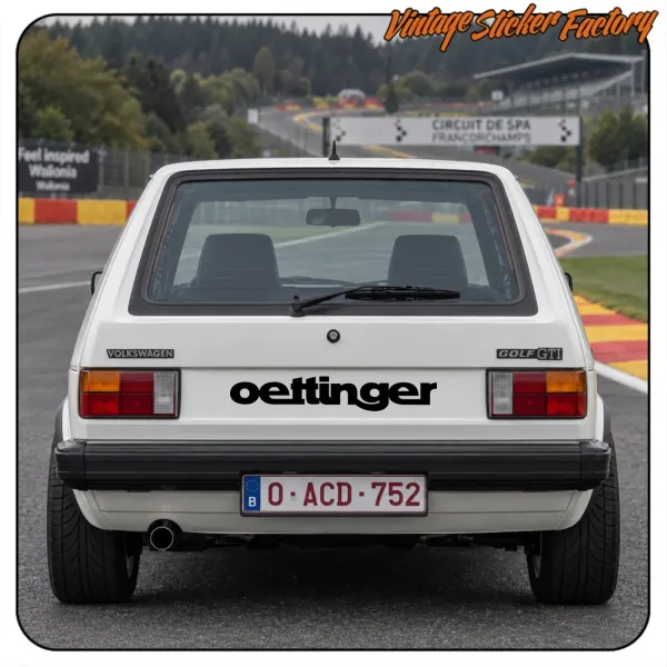 Rear view of a white Volkswagen Golf GTI with the OETTINGER sticker applied