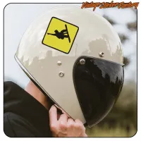 Snowboard design in yellow and black diamond applied to a light-coloured helmet with dark visor