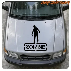 Schwarzes Zombie-Design auf der Motorhaube eines grauen Fahrzeugs