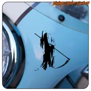 Scythe applied to the blue bodywork of a classic vehicle
