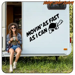 “MOVIN’ AS FAST AS I CAN” vinyl with a turtle, applied to a caravan beside a person