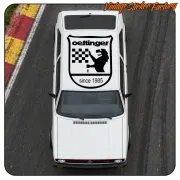 Autocollant OETTINGER appliqué sur le toit d’un véhicule blanc sur un circuit