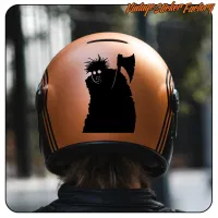 Close-up of the PSYCHO design applied to an orange motorcycle helmet