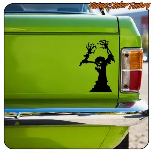 Mummy silhouette applied to the rear of a green vehicle