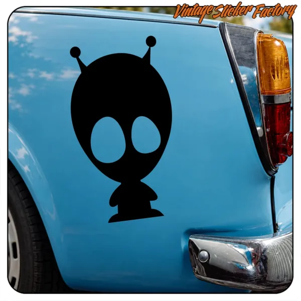 Black alien silhouette on blue bodywork, beside the rear light and chrome bumper