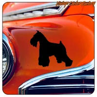 Sticker with a black silhouette of a Schnauzer dog on the orange bodywork of a classic car