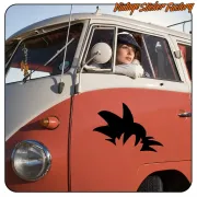 Black silhouette of Goku's hair placed on the door of a two-tone vintage van