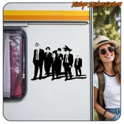 Black adhesive with six figures placed on the white side of a motorhome