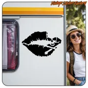 Black lips with skull design applied to the side of a caravan