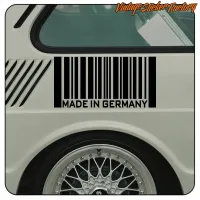 Schwarzer Barcode mit dem Text «MADE IN GERMANY» an der Seite eines weißen Fahrzeugs