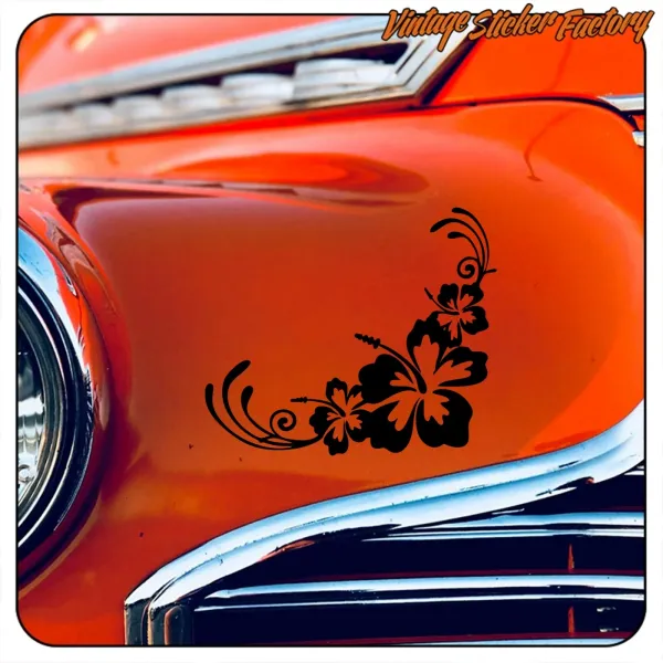 Black Hibiscus sticker on the orange bodywork of a classic car
