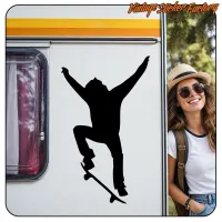 Black skater silhouette applied to a caravan beside a person