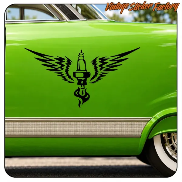 Close-up of the winged spark plug sticker placed on the door of a green car