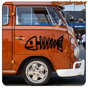Black fish skeleton applied to the side of a classic orange van