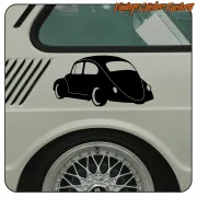 Silueta negra de un Volkswagen Escarabajo aplicada junto a la rueda de un vehículo clásico
