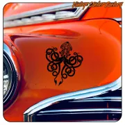 Black KTULU design applied to the orange bodywork of a classic car