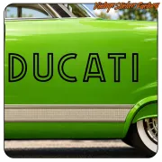 Black DUCATI text applied to the side of a green vehicle