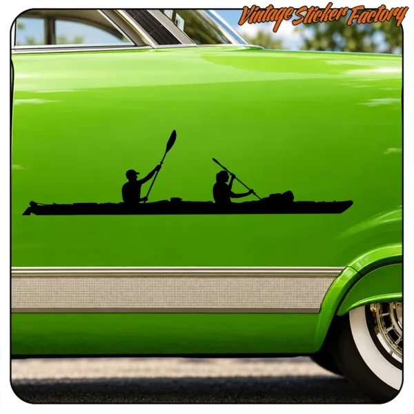View of the double kayak design applied to the door of a green vehicle