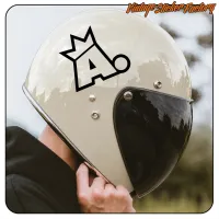 Ansicht des Aufklebers mit schwarzem Symbol eines gekrönten Tieres auf einem Helm mit Visier