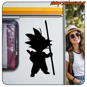 Large Goku silhouette with staff applied to a caravan door