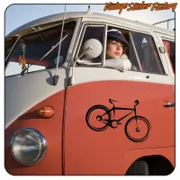 Close-up view of a two-tone van with the mountain bike design applied